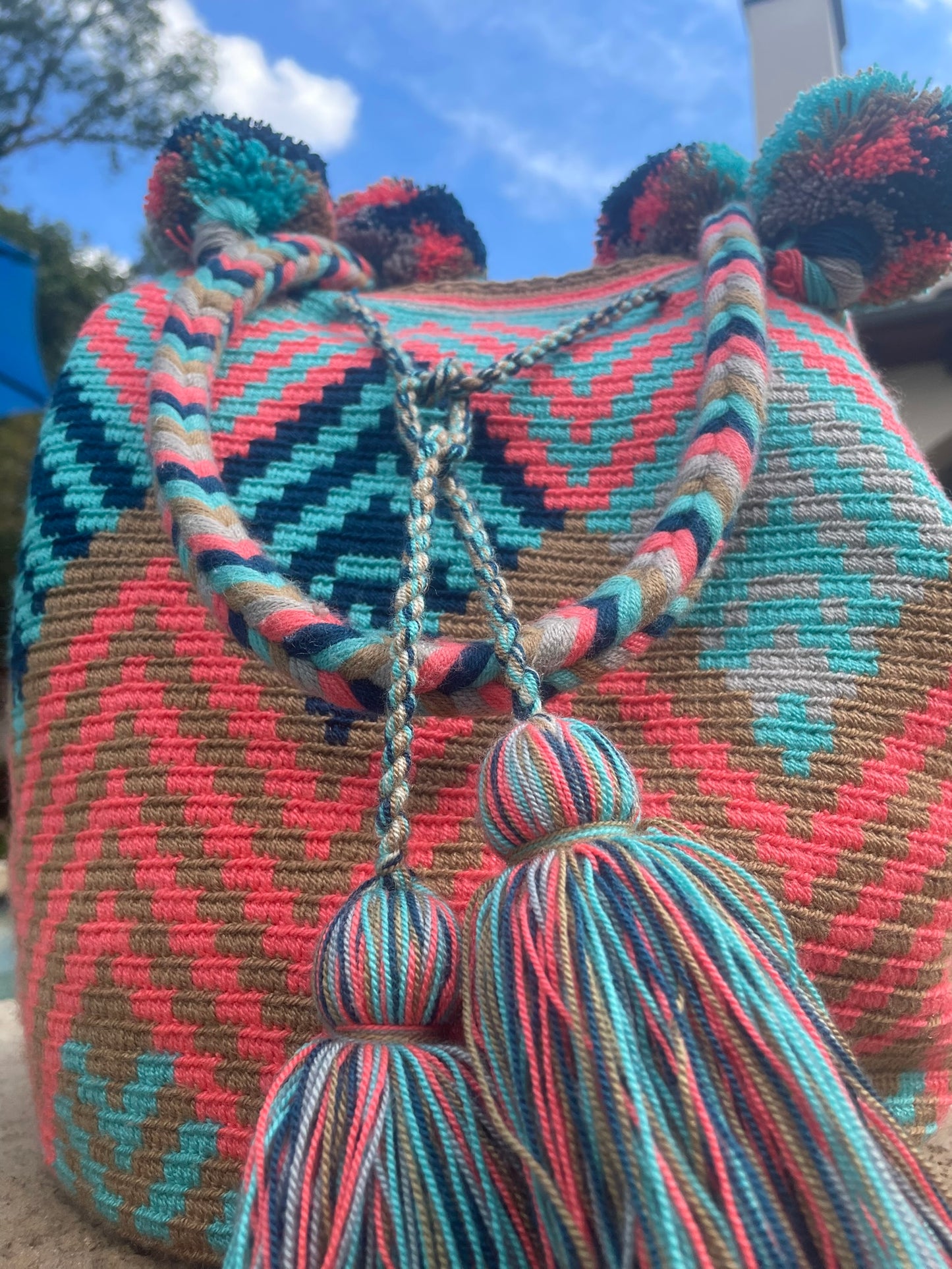 MIRA Hand woven one of a kind Colombian bag with handles and pompoms