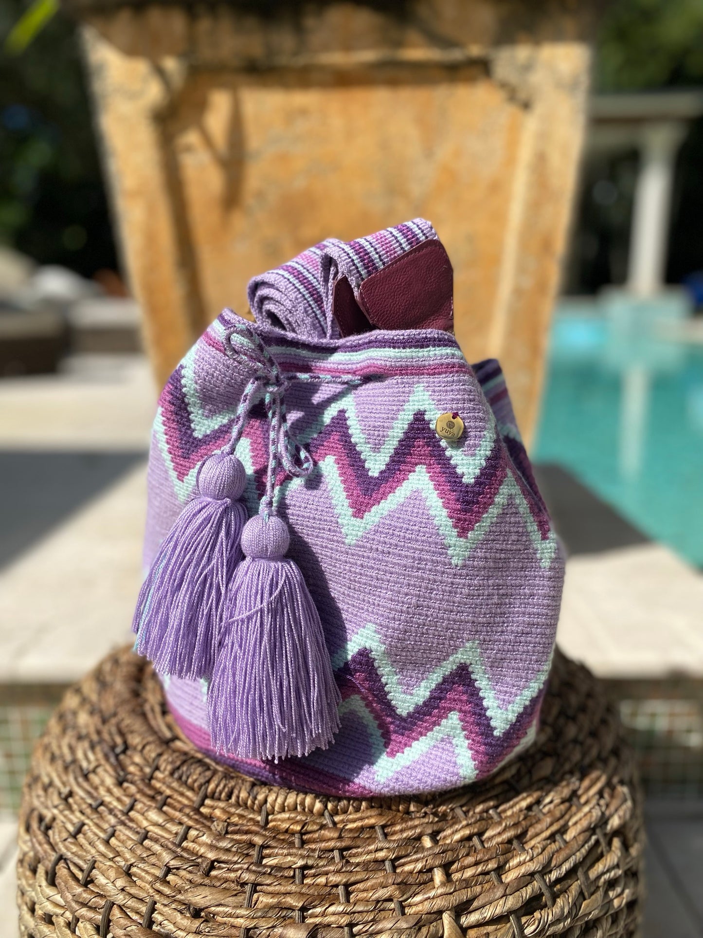 MIRA Hand woven one of a kind Colombian cross-body bag with matching removable shoulder strap drawstring closure and tassels